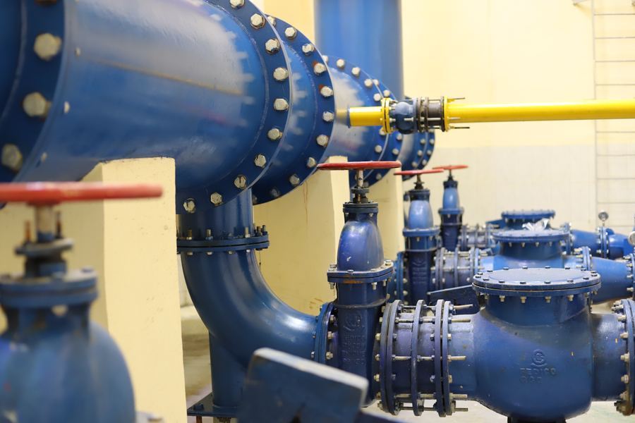 Discharge header and valves